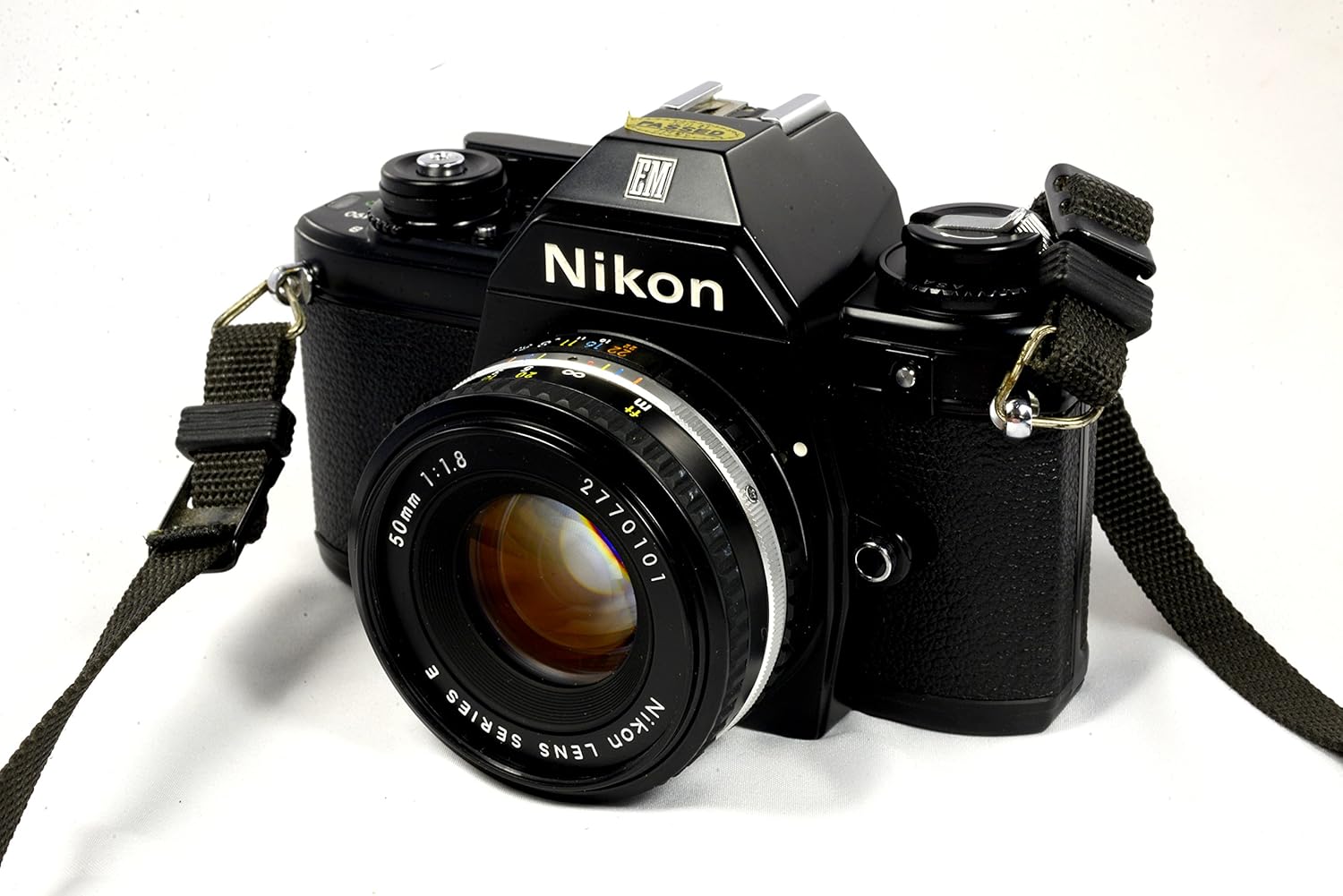 Nikon Em 35mm SLR Film Camera Black Body with Nikon F Mount 50MM F1.8 AI Manual Focus Lens. (Renewed)