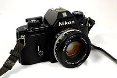 Nikon Em 35mm SLR Film Camera Black Body with Nikon F Mount 50MM F1.8 AI Manual Focus Lens. (Renewed)